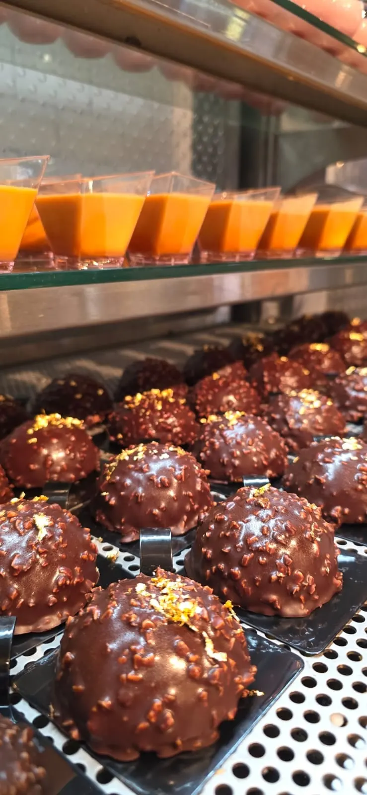 Chocolate domes with gold leaf